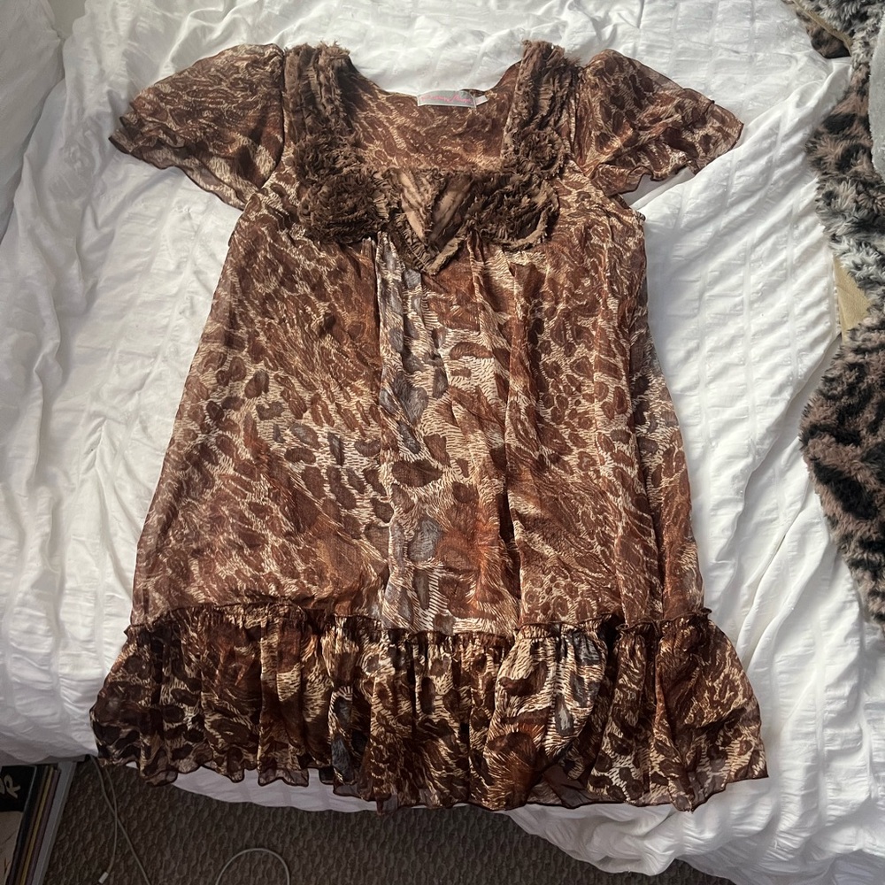 Brown and tan mini dress with ruffles and animal print.
